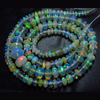 8 inches - Very Rare --Ethiopian Opal --Very Unique --Super Rare --Ethiopian Opal Smooth Rondells --FULL Strand --Super Rare Inside Fire --Very Rare Quality --Fire Opal --Size 2 --5mm Approx Approx